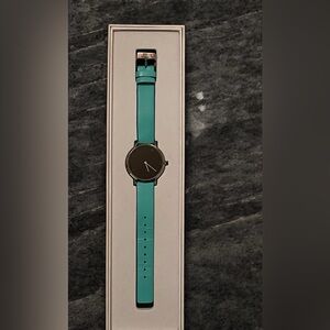 Elegant Black and Teal Women's Medium Watch.